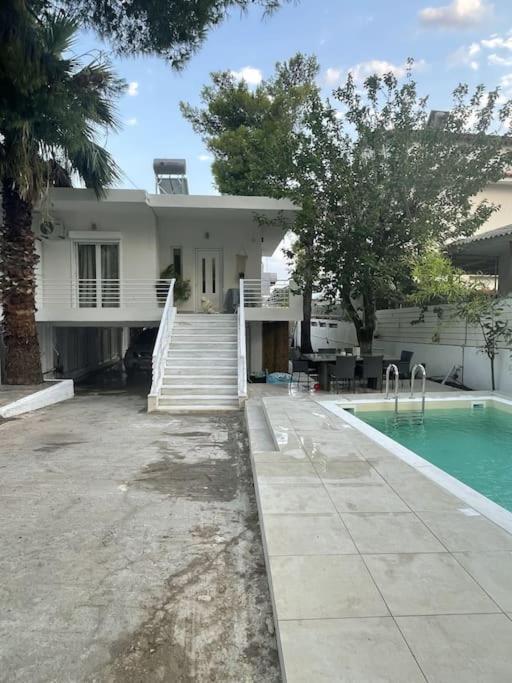 Villa Helio Kineta Bagian luar foto