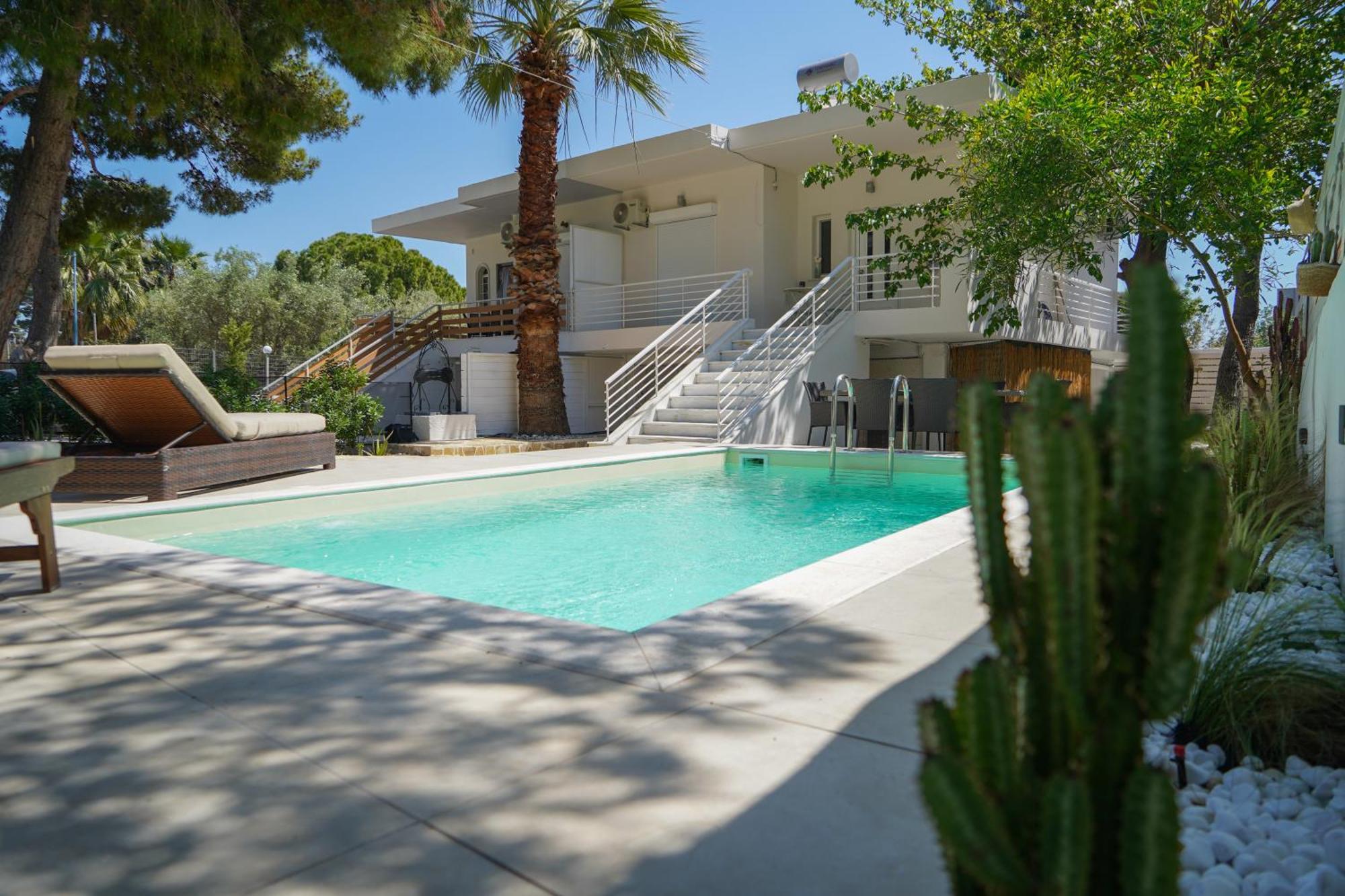 Villa Helio Kineta Bagian luar foto
